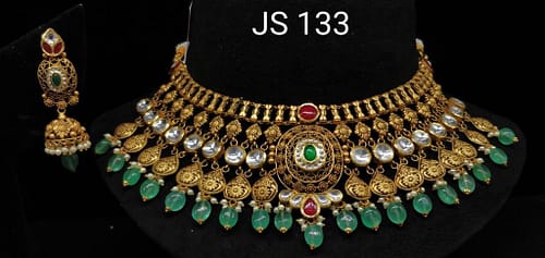 Antique Gold Stone Studded Kundan Necklace With Beautiful Earrings